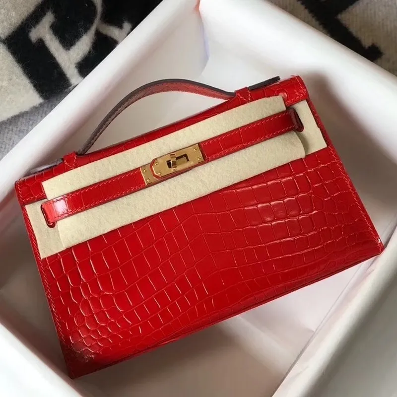 Kelly Pochette Bag In Red Embossed Crocodile Leather