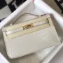 Kelly Pochette Bag In White Embossed Crocodile Leather