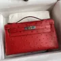 Kelly Pochette Handmade Bag In Red Ostrich Leather