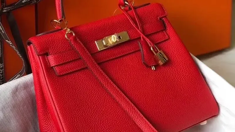 Hermes Red Clemence Kelly 25cm GHW — Timeless Luxury in Compact Form