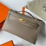 Kelly Pochette Handmade Bag In Taupe Swift Calfskin