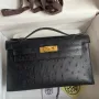 Kelly Pochette Handmade Bag in Black Cuite Ostrich Leather